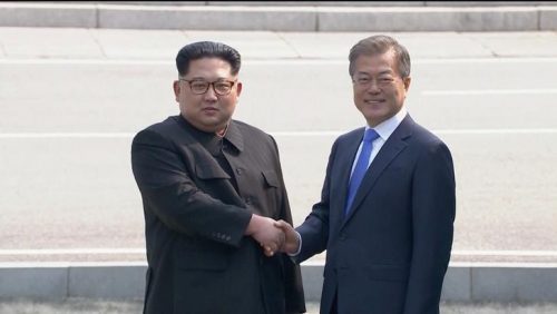 North Korean leader Kim Jong Un shakes hands with South Korean President Moon Jae-in as both of them arrive for the inter-Korean summit at the truce village of Panmunjom, in this still frame taken from video, South Korea April 27, 2018. Host Broadcaster via REUTERS TV  ATTENTION EDITORS - THIS IMAGE HAS BEEN PROVIDED BY A THIRD PARTY. NO RESALES. NO ARCHIVES. SOUTH KOREA OUT.