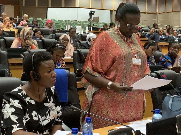 Hon.-Robina-Rwakoojo-makes-a-contribution-during-the-PAP-Conference-on-womens-rights-in-Midrand-South-Africa.-To-her-right-is-Hon.-Justine-Khainz